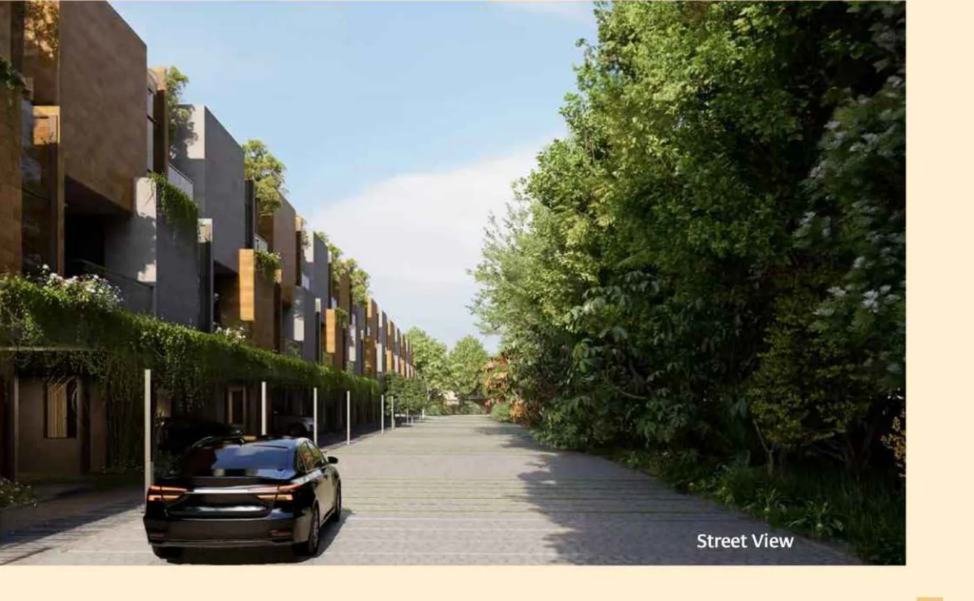 Gravity Smera Gardens tree-lined cobblestone internal street